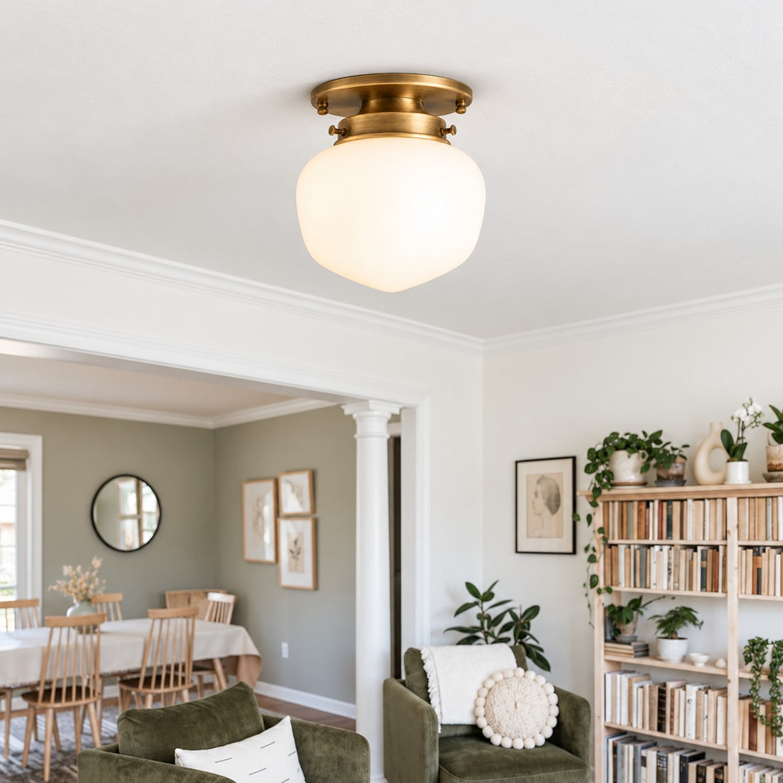 Opelina brass opal glass flush mount styled over a dining table