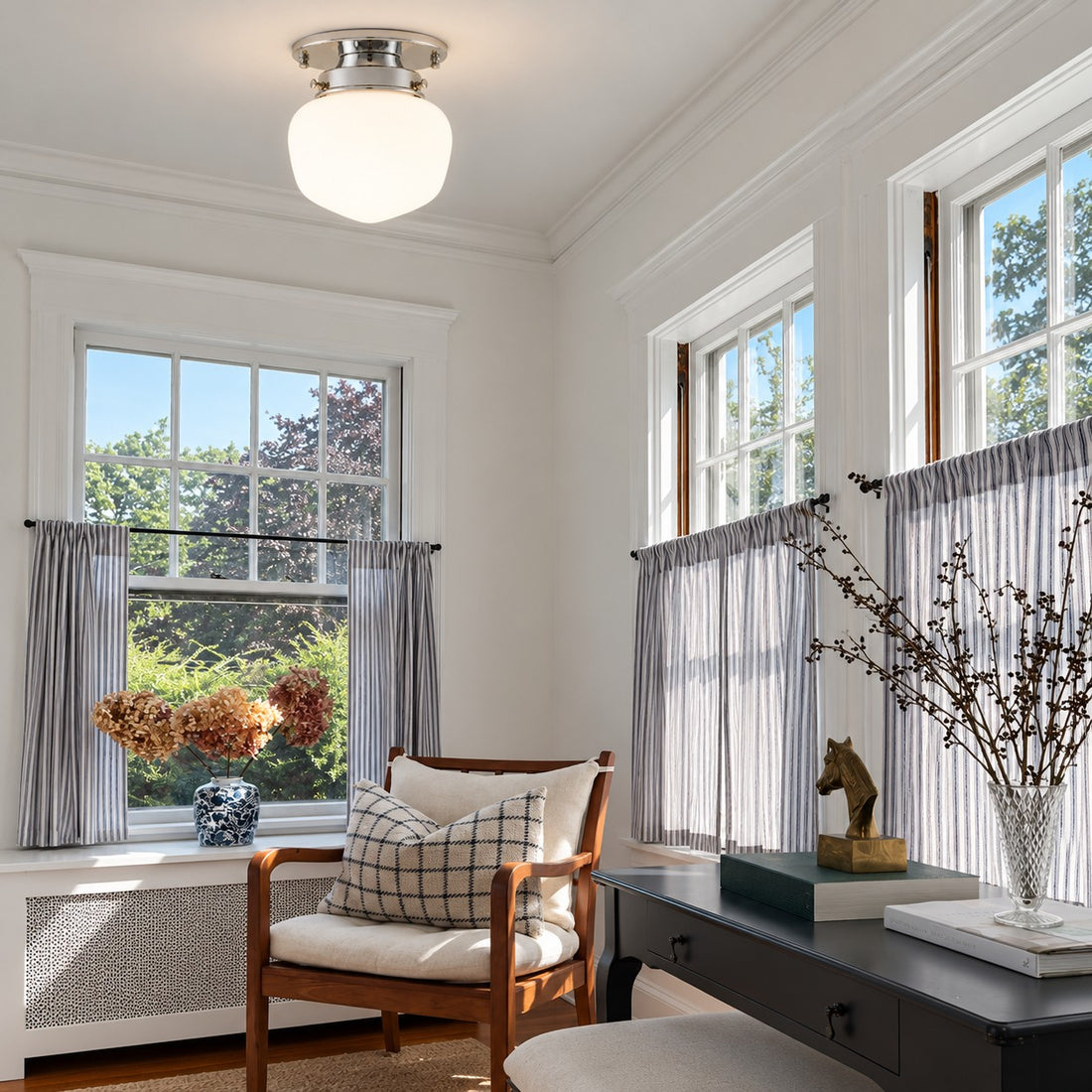 Opelina chrome opal glass flush mount styled in a living room