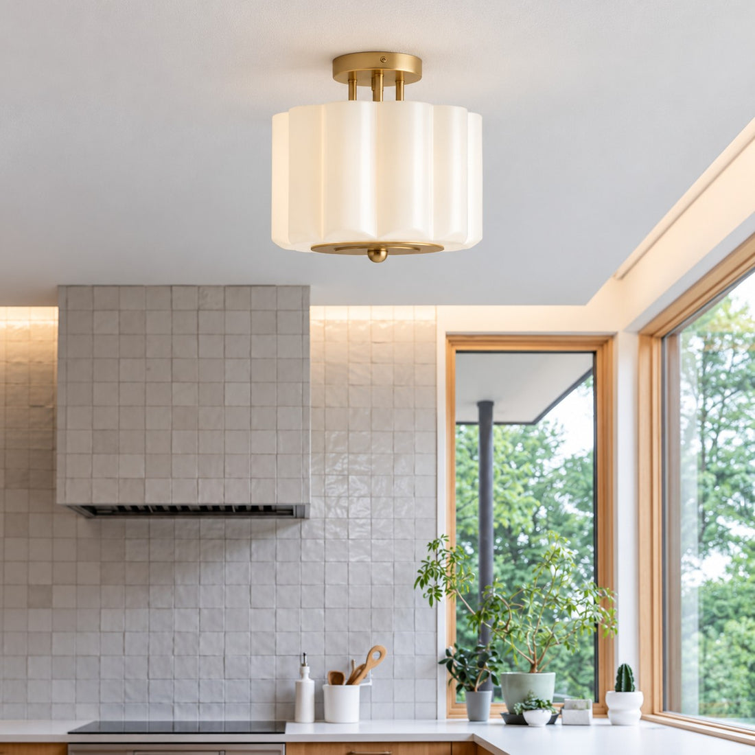 Opelina scalloped milk glass ceiling light over a kitchen island
