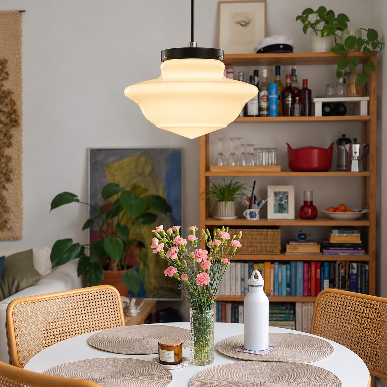 Opelina Model A milk glass pendant over a breakfast table