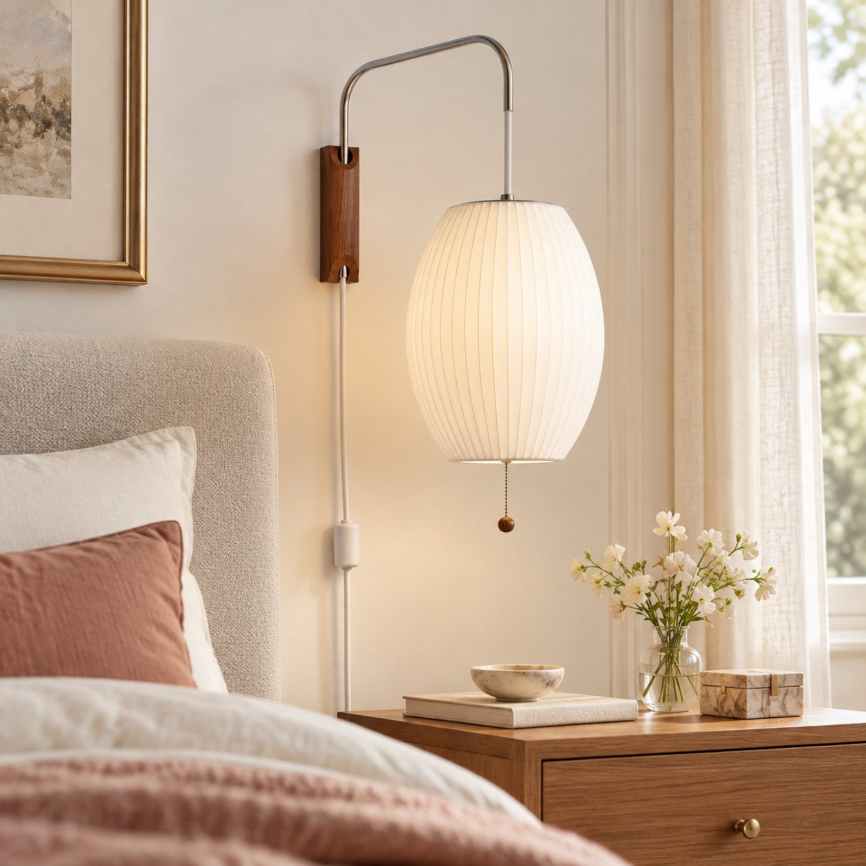 Oriya oval shade plug-in sconce styled in a bedroom
