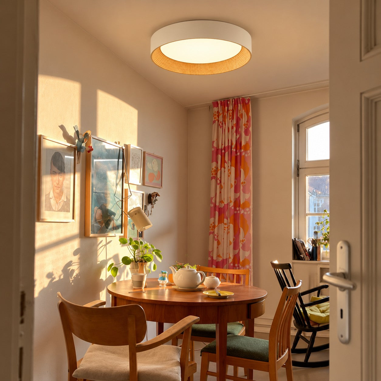 Ceiling light styled in a bedroom with a blue headboard