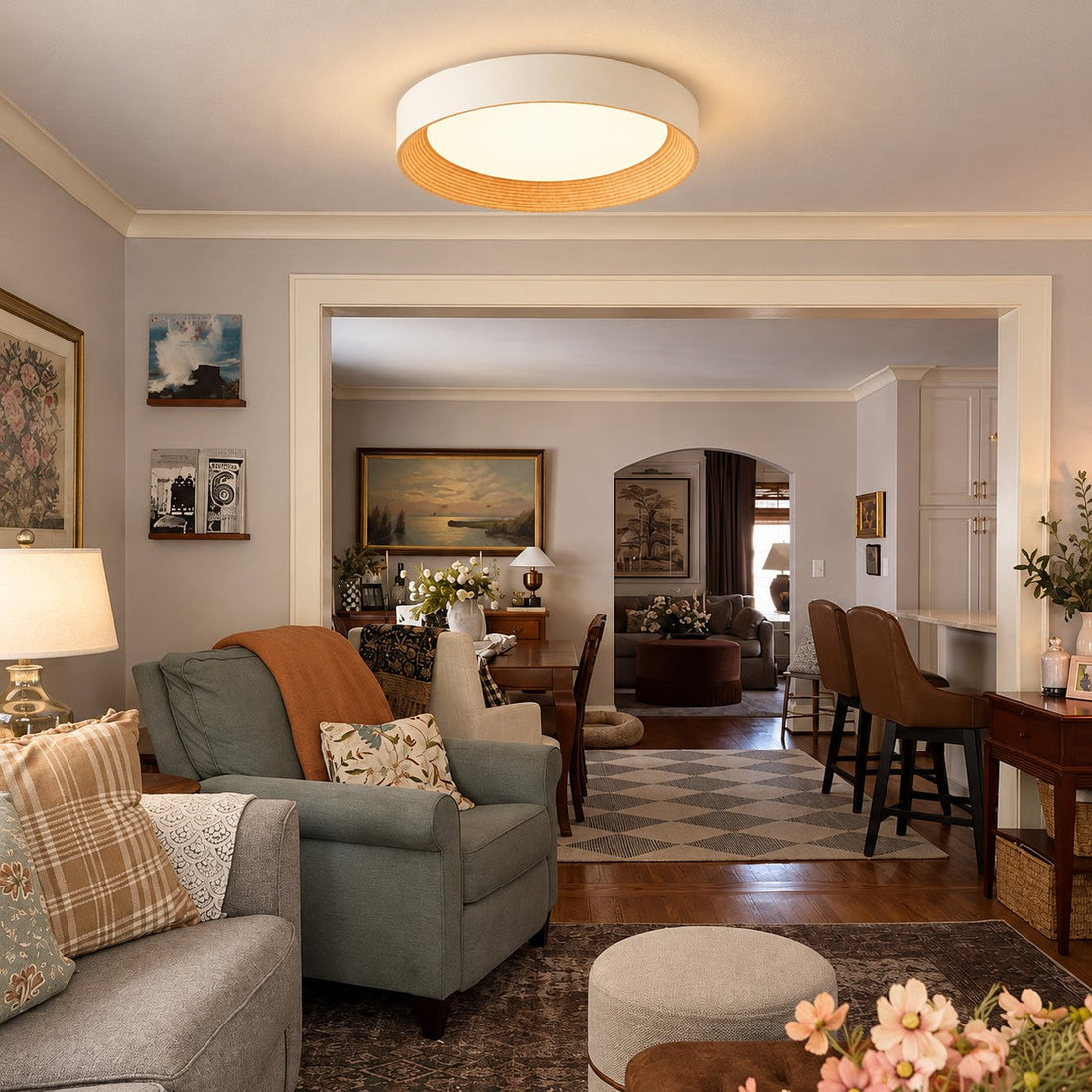 Ceiling light styled in a living room opening to the dining area