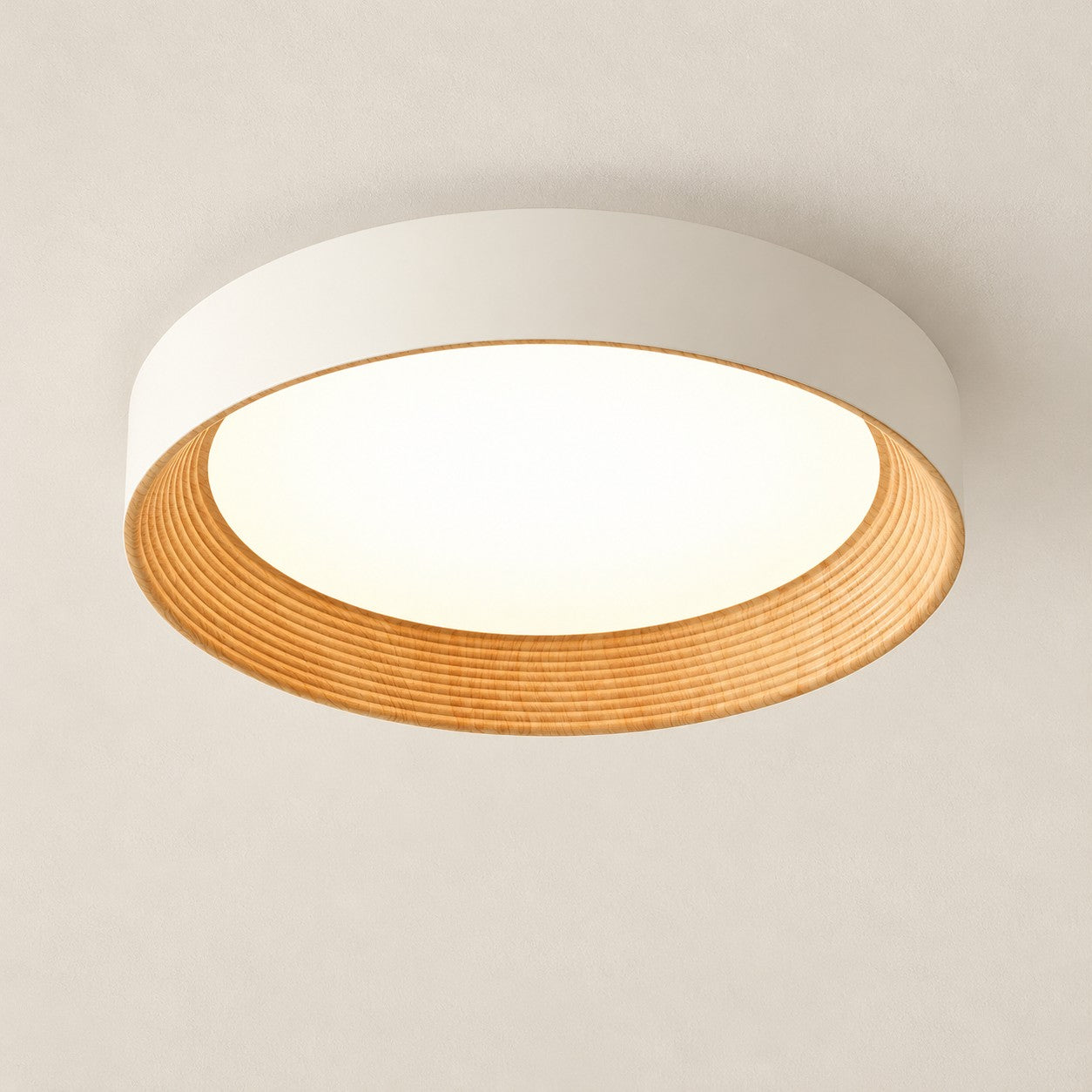 White round ceiling light with layered wood rings