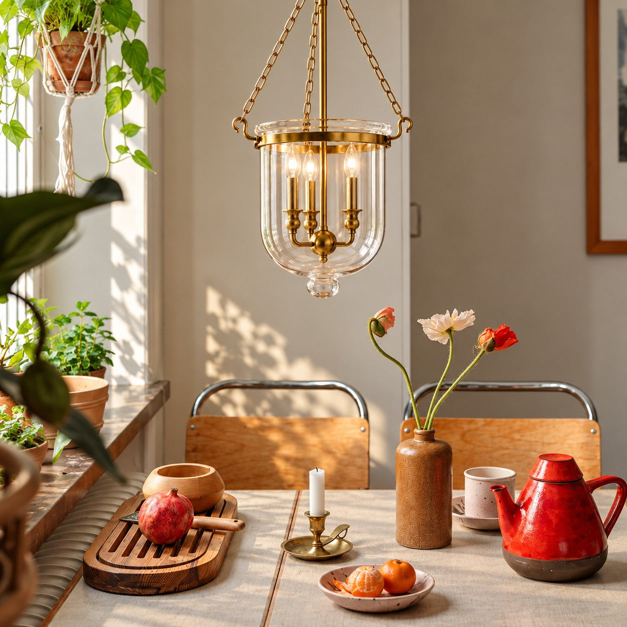 Vitrona clear glass bell jar pendant styled in a breakfast nook