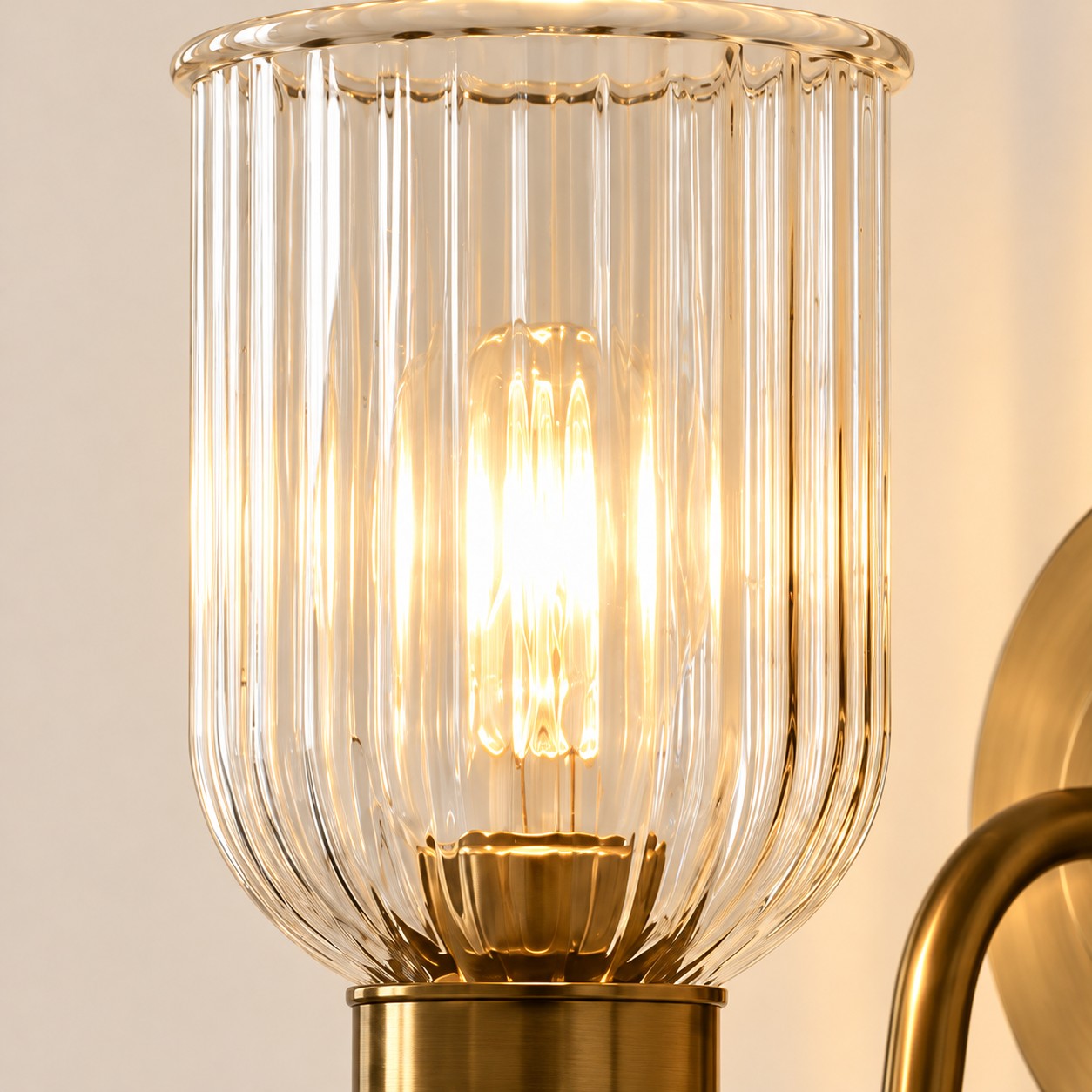 Vitrona ribbed glass wall sconce full shade and brass arm