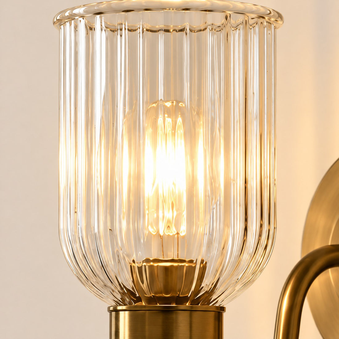 Vitrona ribbed glass wall sconce full shade and brass arm
