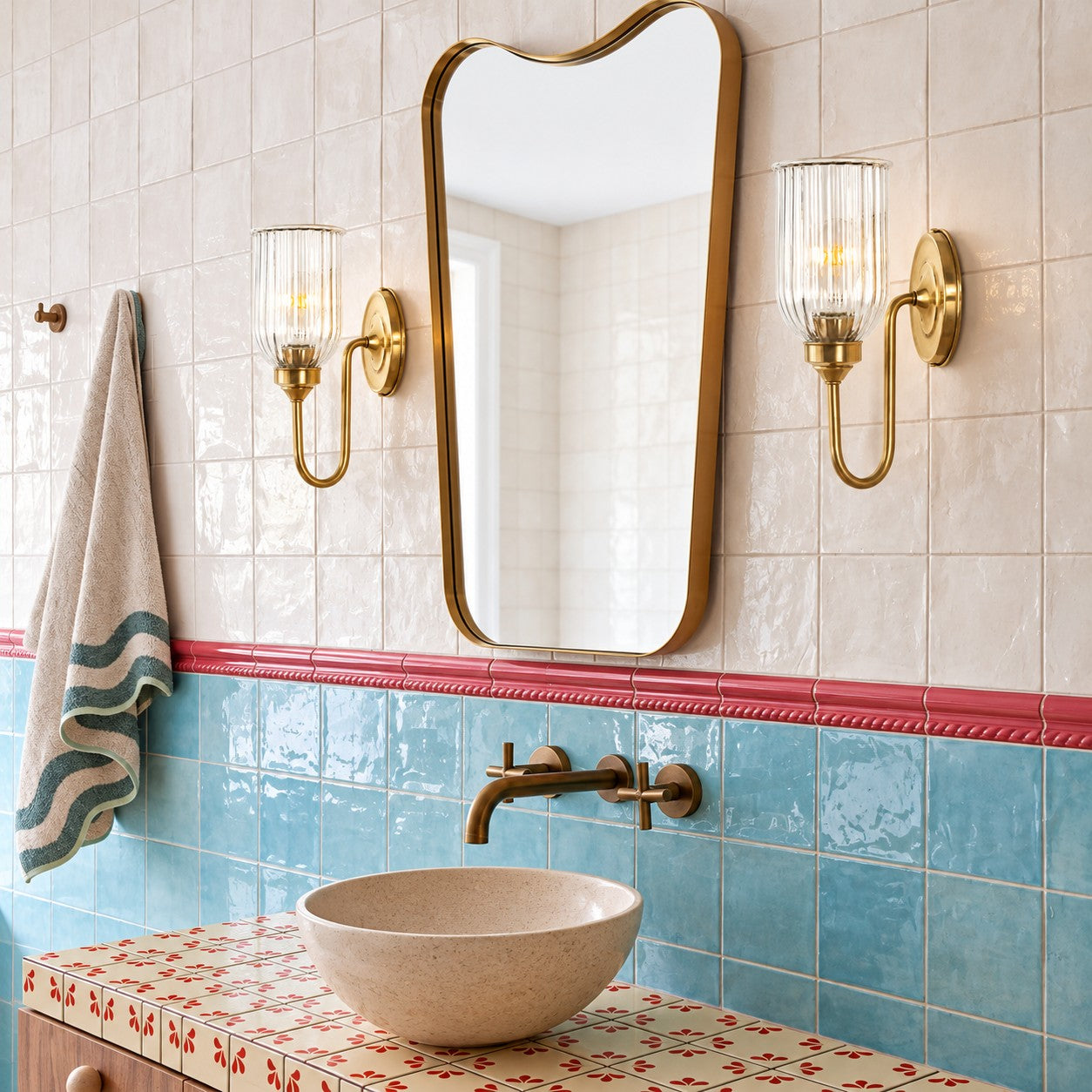 Vitrona ribbed glass wall sconces styled as a pair on a bathroom vanity