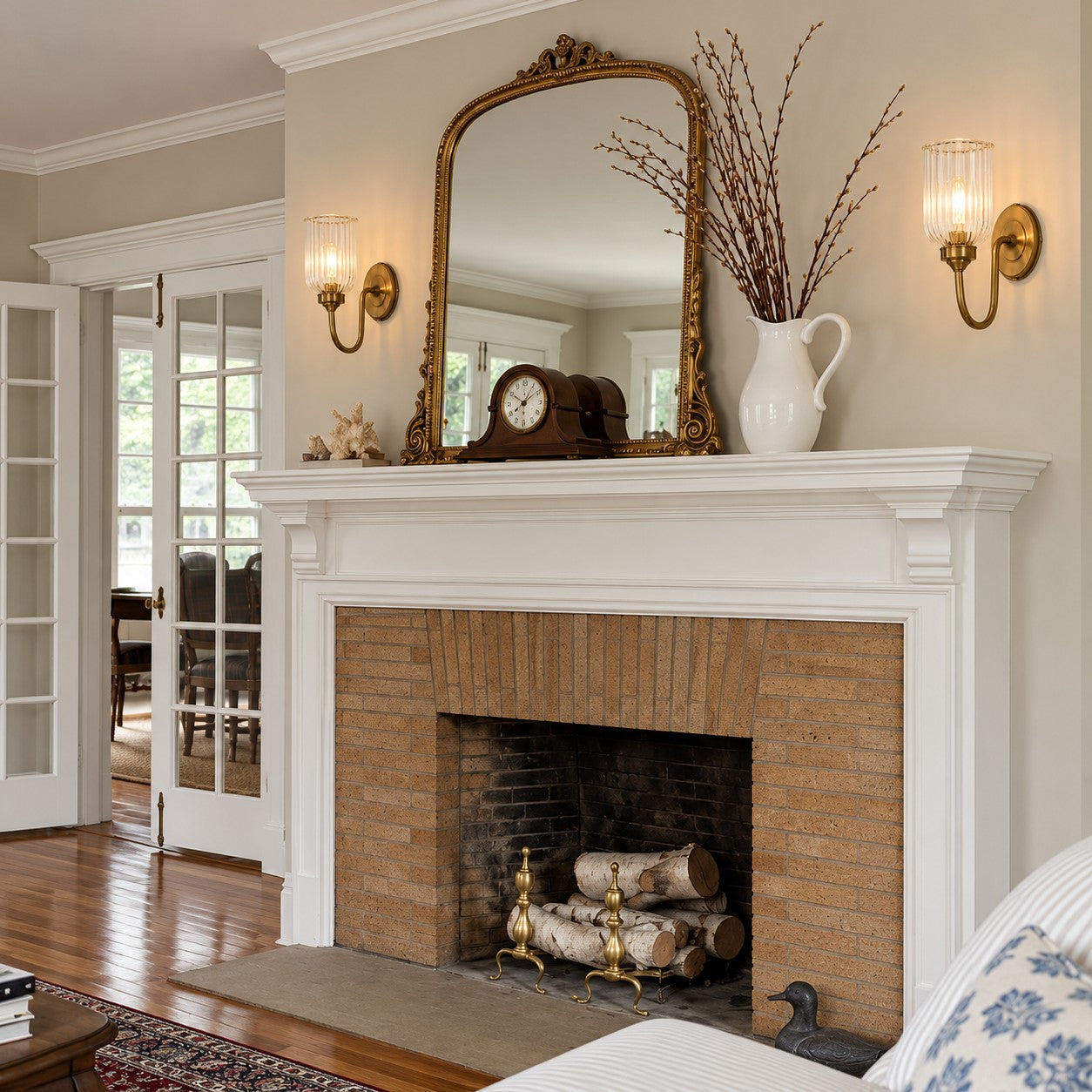Vitrona ribbed glass wall sconces styled as a pair over a fireplace